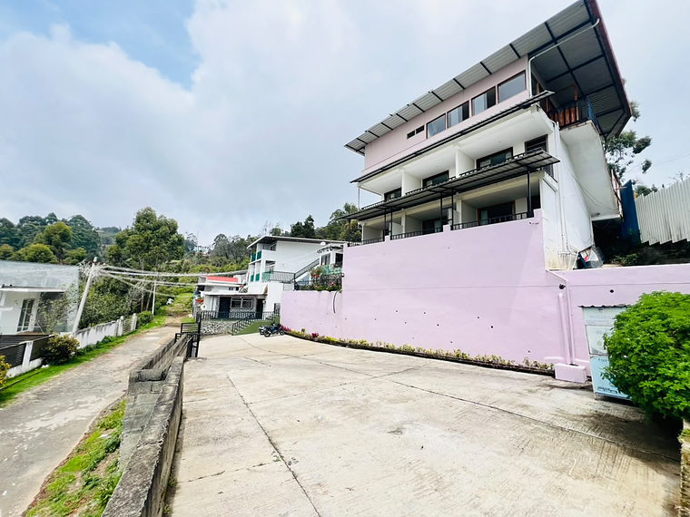 On-site parking, with the property behind