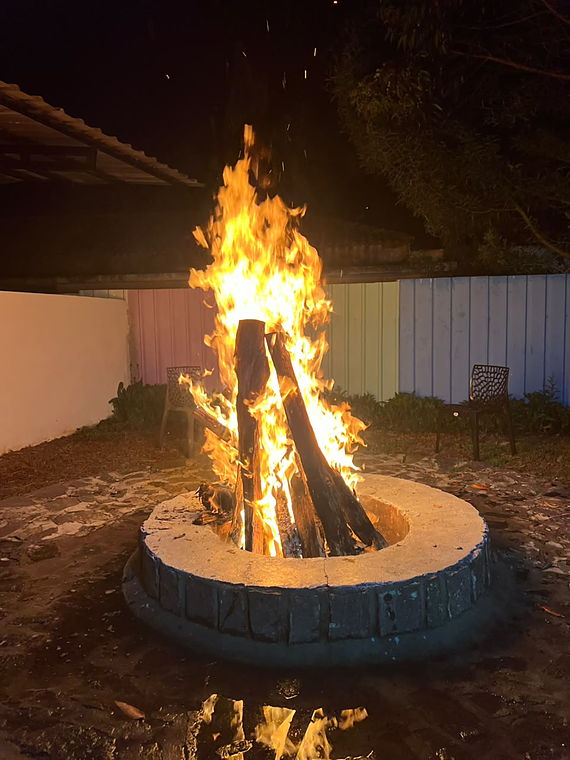 The bonfire lit up after dark