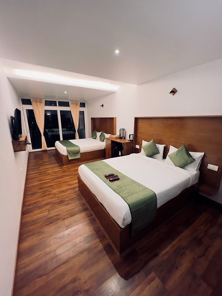 Luxury Room with twin beds and valley-facing balcony