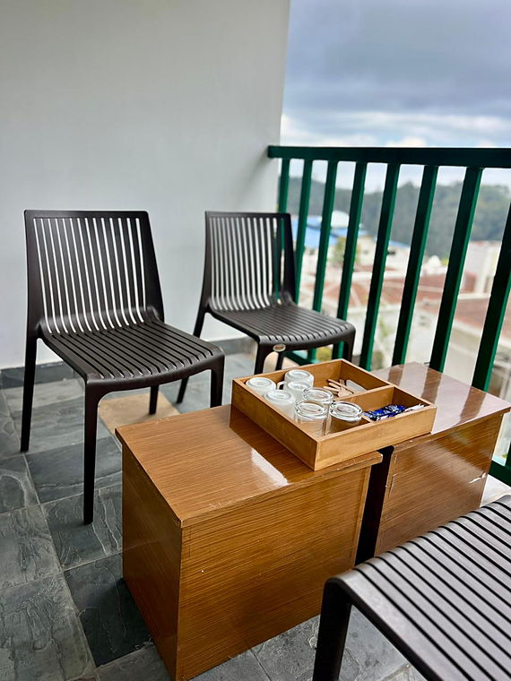 Balcony seating and tea tray in the Luxury Room